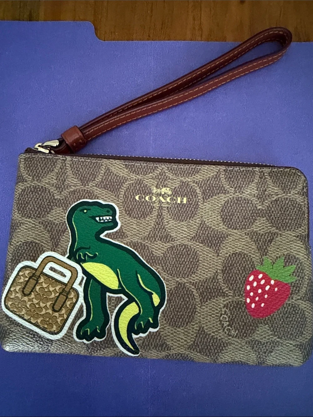 Coach Brown Signature Canvas Wristlet with Green Dino and Red Strawberry Patches